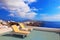 Two deckchairs on the roof. Santorini island, Greece