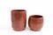 Two decorative clay vases. Made by hand on a potter`s wheel. In a single copy. On white background. Handmade, OOAK. Set