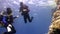 Two deepwater scuba divers swimming near coral reefs underwater in Red sea.