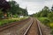 Two Deserted Railway Tracks and Cloudy Sky