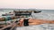 Two Dhows or mokoros in the shallow sea water at Jamibiani Beach, Zanzibar