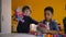 Two diverse kids arguing over toy in kindergarten