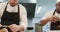 Two diverse male chefs decorating meals in kitchen, slow motion