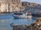 Two docked vintage wooden motor boat at sea at Saint Pauls bay