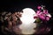 Two doll hugging on table with flowers and moon decoration Lighted background with smoke.Love concept. Greeting or gift card desig