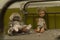 Two dolls over a rusty bed inside an abandonated kinder garden at chernobyl