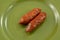 Two dried cured chorizo pork sausages