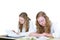 Two dutch teenage girls studying books for education