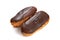 Two eclairs with chocolate glaze isolated