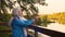 Two elderly woman making selfie photo to smart phone on autumn landscape