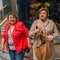 Two elderly women communicate in the Mall