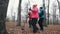 Two elderly women fast walking on sticks of nordic walking