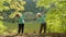 Two elderly women warm-up before Nordic walking