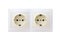 Two electric sockets. Two electrical outlets are beige and white paired. Isolated. Double