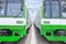 Two electric trains with green and white colour