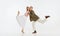 Two emotional dancers in vintage style clothes dancing swing dance, rock-and-roll or lindy hop  on white