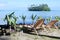 Two empty beach seats on Muri lagoon in Rarotonga Cook Islands