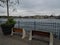 Two empty seats benches on sea embankment