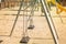Two empty swings in a playground due to covid-19 quarantine.coronavirus prevention