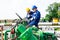 Two engineers working inside oil and gas refinery