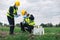 Two Environmental Engineers Inspect Water Quality and Take Water Samples Notes in The Field Near Farmland, Natural Water Sources