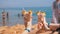 Two exotic cocktails in the hands of girls at the background of the sea and beach in Egypt.