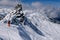 Two experienced skiers getting ready downhill off piste area at the Meribel ski resort in France.