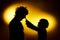 Two expressive boy\'s silhouettes showing emotions using gesticu