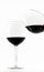 Two exquisite transparent glasses with red wine - one pouring wine into the other - on a white background