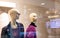 Two fashionable and stylish mannequins in modern glasses and warm business clothes. The concept of selling quality and stylish