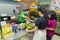 Two female customers ordering food at the cashier in a filipino reastaurant