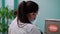 Two female doctor in protective mask discussing treatment patient. Dentist work