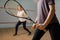 Two female players with rackets, squash game