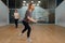 Two female players with rackets, squash game