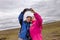 Two female turist friends traveling photographers take a selfie