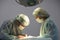 Two female veterinarian does cat sterilization surgery and sews up the wound.Veterinary surgery