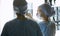 Two female women medical doctors looking at x-rays in a hospital