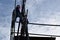 Two Filipino Construction steel workers assembling steel bars on high-rise building with no proper protective suits and safety sho