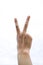 Two fingers victory peace sign body language