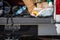 Two firearms sitting on the tail gate of a pickup truck during a search of a vehicle.