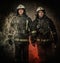 Two firefighters in a smoke
