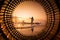 Two fishermen are fishing at the lake during sunset in Chonburi