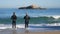 Two fishermen are fishing in wetsuits in clear sunny weather