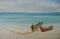 Two fishing boats on the beautiful beach with blue sea