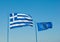 Two flags are developed in the wind, Greece