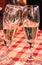 Two flutes of champagne toasting