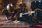 Two focused guitarists holding their guitars and correcting note sheet while sitting on the patterned carpet in their