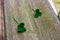 Two Four Leaf Clovers on Wood Porch Railing