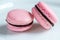 Two french desert pink macaron cakes