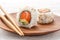 Two fresh salmon and avocado sushi uramaki